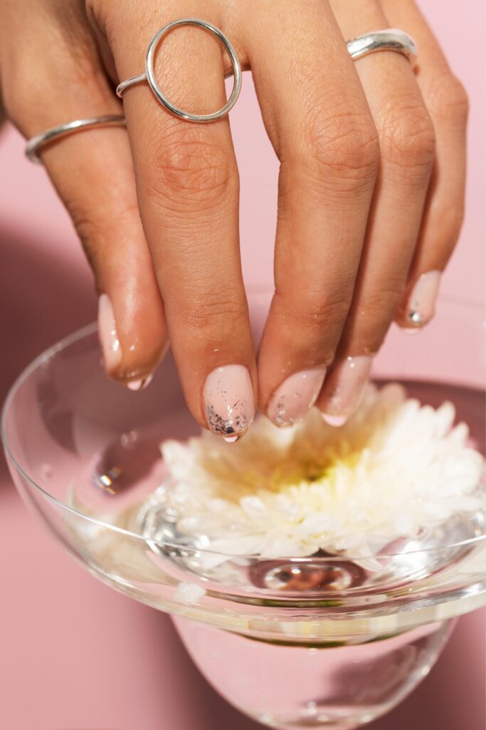 a hand that is being cleaned from the gel products