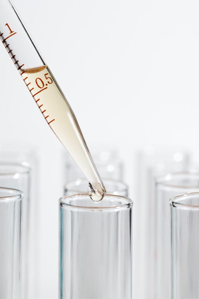 Close-up of chemical bottles used in nail polish stickers, asking " Do nail polish stickers have formaldehyde ? "