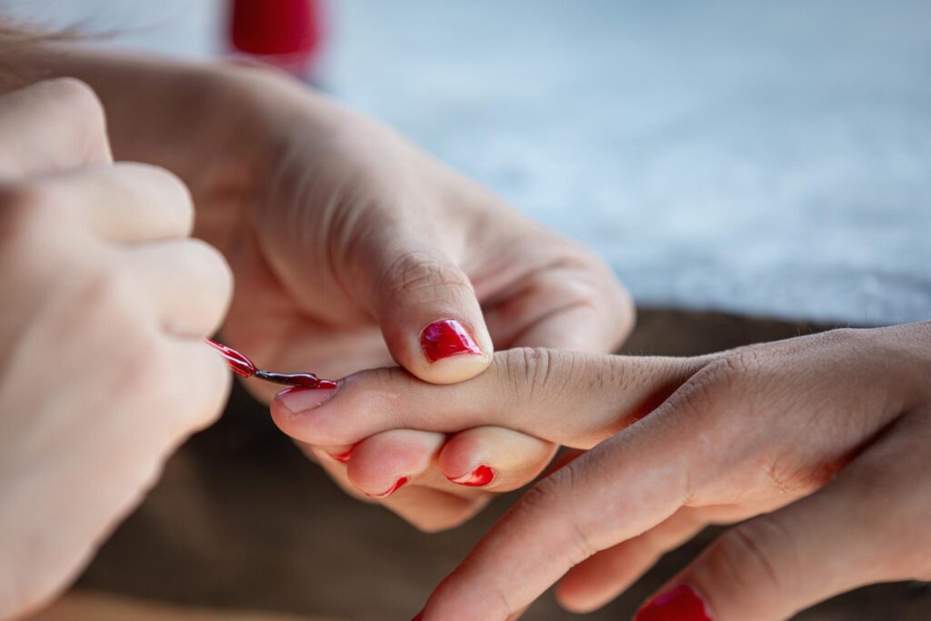 apply red gel polish 