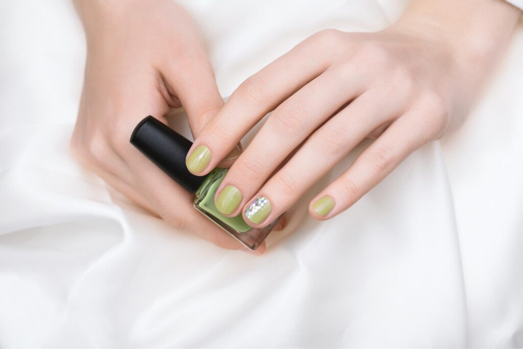 A close-up of elegant, well-maintained nails with a delicate gel polish application