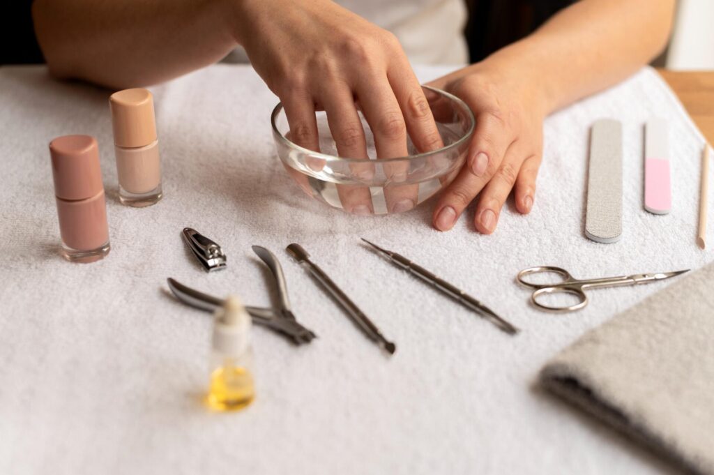 a person removing nail gel 