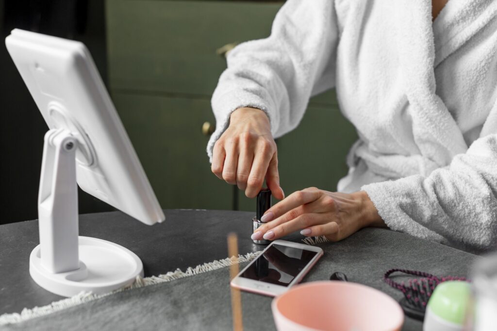 a woman maintinig her nails